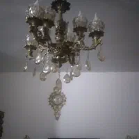 یک لوستر ۸شاخه  برنز دوساعت دیواری برنز