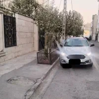 یک عدد خودروی اطلس نقره ای فول آبشن مدل 1404