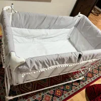 تخت کودک ننویی کنار تخت مادر