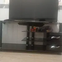 زیر تلویزیونی شیشه ای مشکی