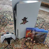 ps5 به همراه پایه شارژ و سه دیسک بازی