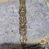 مجسمه گمونم برنجه با یک چیز مسی کلکسیونی