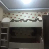 تخت خواب دو طبقه و کمد