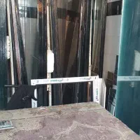 شیشه بری ساختمان شهر صدرا
