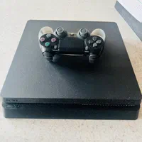 PS4 slim 1tra+یک دسته+ چهار تا بازی