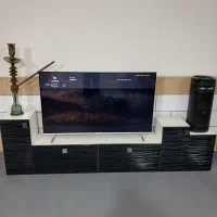 ساعت ایستاده و زیر تلویزیون