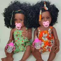 عروسک بزرگ با پوست سفید و تیره ۶۰ سانتی