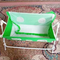 گهواره کودک و لباس سرهمی پشمی نوزاد.فروشی