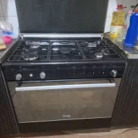 اجاق‌گاز فر دار  وجوجه گردان سینجر