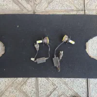 تاقچه عقب پژو همراه با یک جفت هدلایت