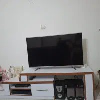تلوزیون ال ای دی با میز و باند