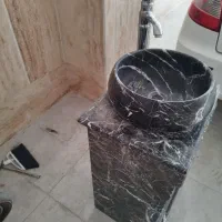 روشویی سنگی به همراه شیر آب