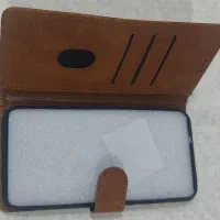 بک کاور گوشی چرم A11|لوازم جانبی موبایل و تبلت|شیراز, شهرک گلستان|دیوار