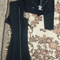 یک دست کت شلوار مجلسی