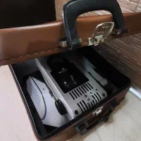 اورهد قدیمی با چمدان