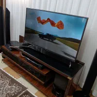 آینه و بوفه کامل با ظروف پذیرایی و میز تلویزیون