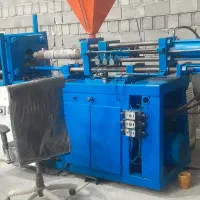 دستگاه تزریق پلاستیک در حال کار