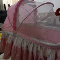 گهواره تاشو چرخدار