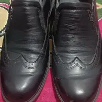 چهار جفت کفش مردانه .