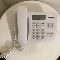 گوشی تلفن و میز تلفن در حد نو