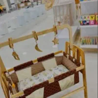 گهواره چوبی ایسان|تخت و صندلی بچه|شهرکرد, |دیوار