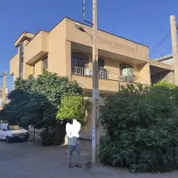 ساختمان-دوطبقه-سه-واحدی-سرنبش-با-مغازه-تجاری