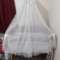 تخت نوزاد کنار مادر برقی و گهواره