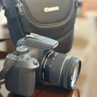 دوربین Canon 2000d به همراه پایه دوربین رایگان