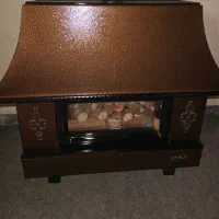 بخاری طرح شومینه نیک کالا تقریبا نو و کاملا سالم