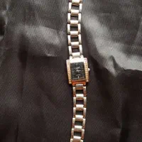 ساعت و انگشتر تک نگین