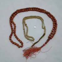 نگین درنجف تسبیح سنگ گربه زرد و چوب سبک معاوضه