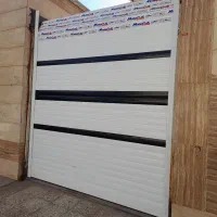 درب کرکره برقی جک بازویی شیشه سکوریت