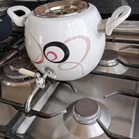کتری لعابی شیر دار