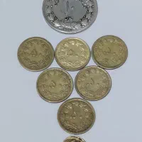 تعدادی سکه ۵۰ دیناری برنز اصل زبر مدال وساعت