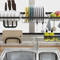 آبچکان روی سینک آلومینیومی مشکی