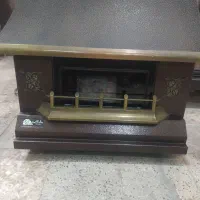 بخاری شومینه طلایی ومرواریدسوز