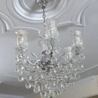 لوستر شش شاخه کریستال بسیار زیبا با یک ساعت دکوری