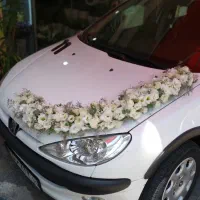 ماشین عروس دسته گل عروس