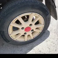 رینگ اسپرت سایز ۱۳ و کمپرس کولر و شیشه بالا بر ریو