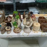 تولید انواع گلدان مجسمه.تنگ ماهی ظروف پذیرایی