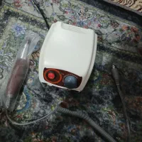 دستگاه کاشت ناخن