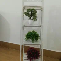 فرو ش استند همراه گل مصنوعی