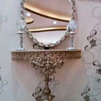 آینه و کنسول با شمعدانی