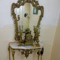 آینه و شمعدان وساعت و کنسول برنجی