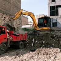تخریب ساختمان خاکبرداری بیل مکانیکی پیکور مینی بیل