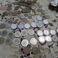 تعدادی سکه 25تومانی و اسکناس