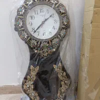 ساعت دیواری و مجسمه اسب نو