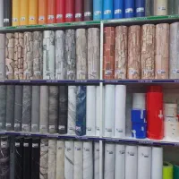 برش و نصب تخصصی برچسب شیشه و کابینت
