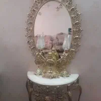 اینه وشمعدان وساعت