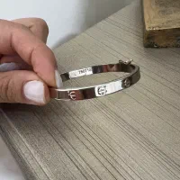 دستبند لاو کارتیه و گوشواره طلا